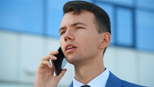 Businessman Talking On Phone