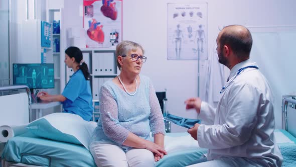 Radiology Office Specialist Looking at X Ray