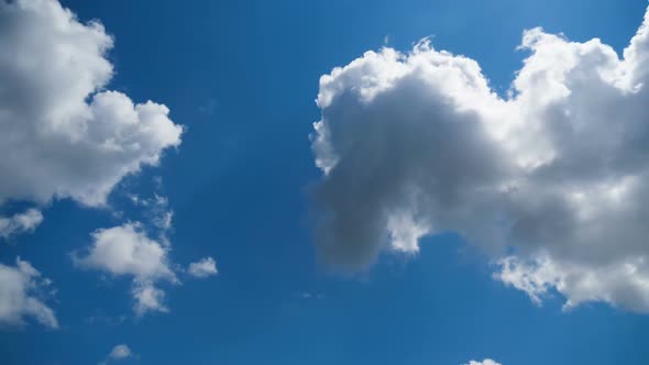 Clouds Move Smoothly in the Blue Sky. Timelapse