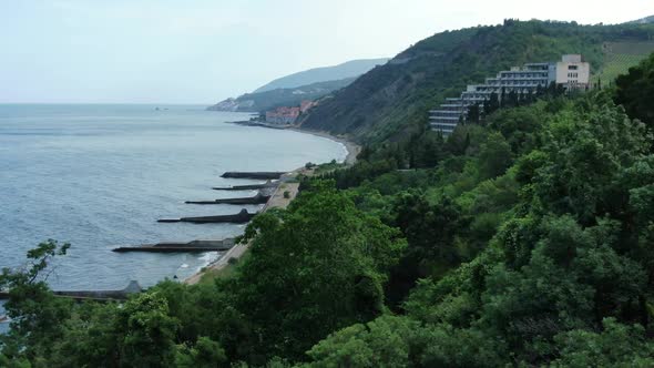 The Coastline of Alushta with the Embankment and Coastal Hotels on the Mountain Slope