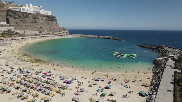 Stunning aerial view over Playa de Amadores artificial beach, Gran Canaria