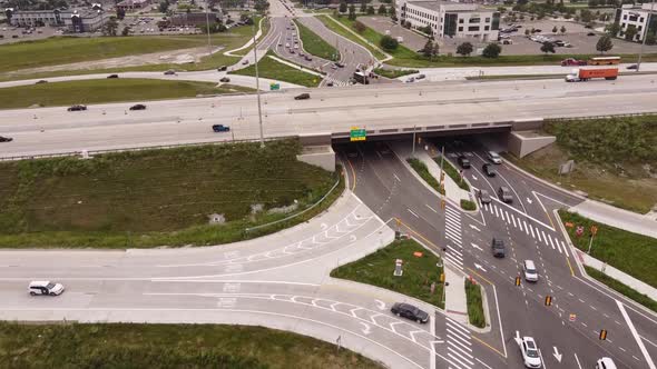 Driving Through Diverging Diamond in Michigan, USA  In The Afternoon - aerial shot