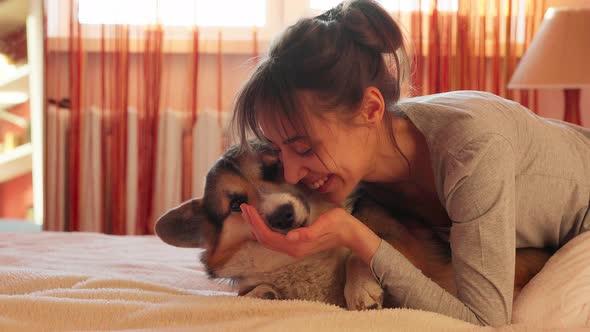 Cute Lovely Dog Licking Girls Hands