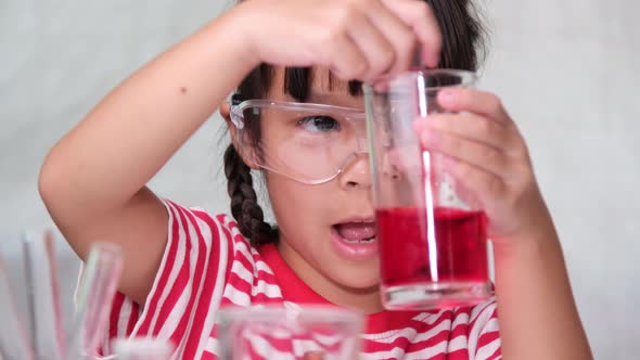 Children are learning and doing science experiments in the classroom.