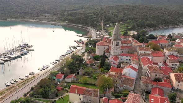 Aerial view of man-made canal crossing the city of Osor, Croatia.
