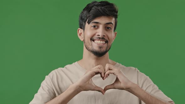 Smiling Hispanic Arab Joyful Man Guy Indian Boyfriend Looking at Camera Show Charity Love Gesture