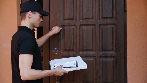 Delivery Service. Man Delivering Pizza To Clients Home