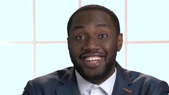 Face of Happy Smiling Afro-american Businessman.