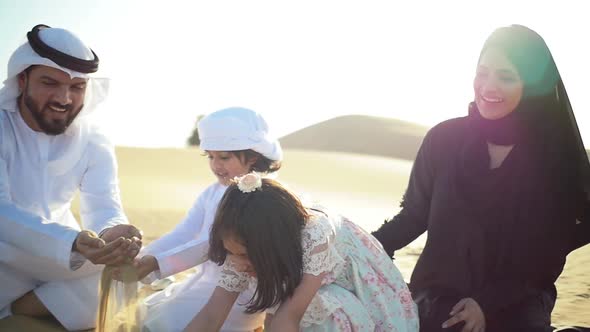 Family from the emirates in the desert