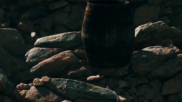 Old Wooden Barrel on the Rocks