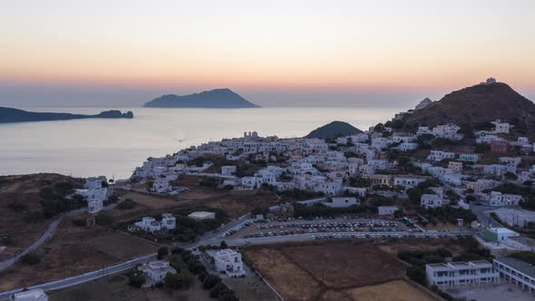 Aerial Hyper Lapse Above Typicall Greek Village at Sunset Overlooking the Aegean Sea, Cyclades