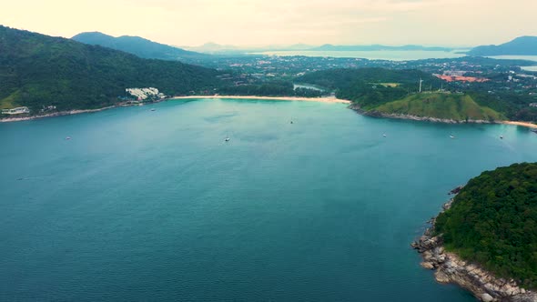 Aerial view of beautiful tropical beach and sea with trees on island for travel and vacation. Nai Ha