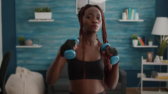 Slim Fit Woman with Black Skin Wearing Sportswear Practicing Fitness Workout / Videohive