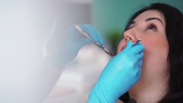 Closeup Process Brushing Teeth in Dental Clinic