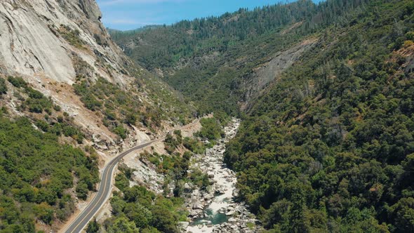 River & Road In The Valley