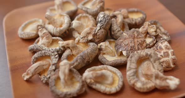 Dry of the mushroom on wooden plate