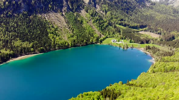 Beautiful view from the Signalkogel to the Lake Langbathsee and Mountains drone video