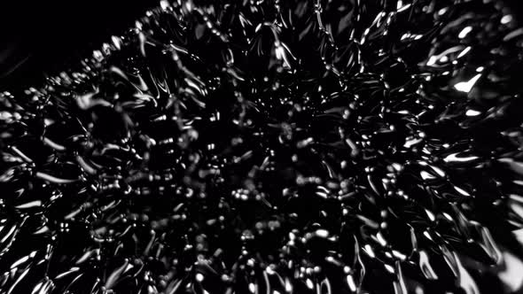 Super Slow Motion Macro Shot of Magnetic Liquid Ferrofluid in Motion at 1000Fps