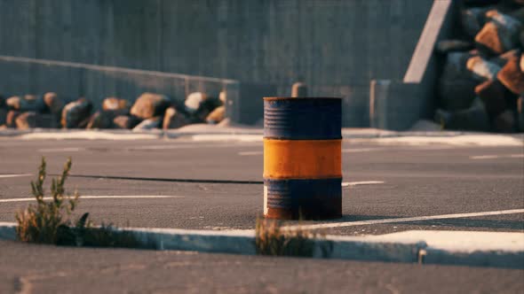 Old and Rusty Metal Barrel on Parking