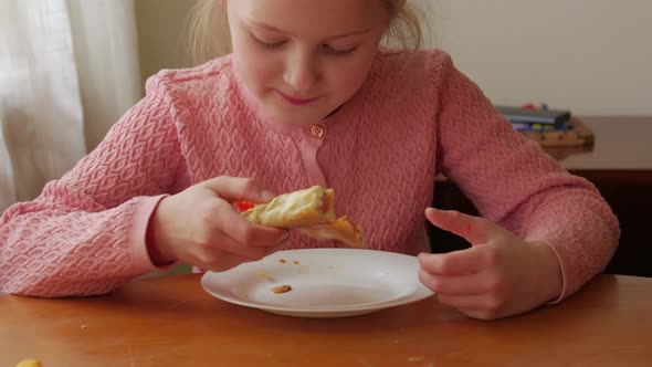 Little Girl Eating Pizza