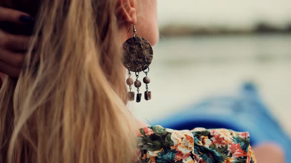 Close Up Woman In Earrings Relaxing On Sunset Having Fun On Holiday Vacation Weekend.