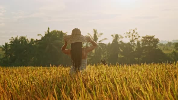 Teenage Girl Enjoy with Sun in the Evening Glow. Beauty Girl Outdoors Enjoying Nature