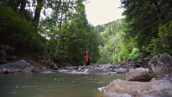 Lady with musical instrument in beautiful nature. 