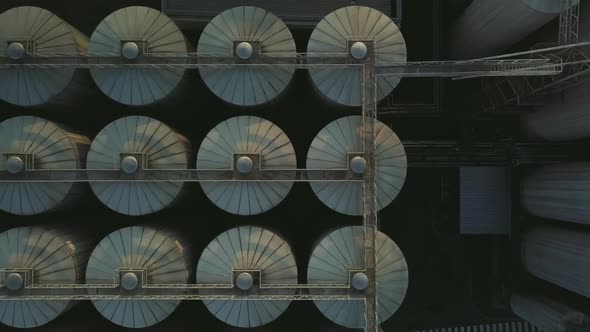 Aerial View of a Drone Flying Over the Beer Production Plant Several Rows of Tanks