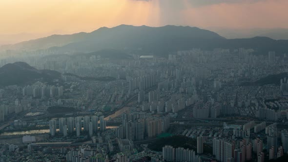 Timelapse Setting Sun Hides Behind Clouds Over Busan City