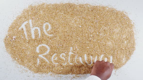 Hand Writing On Beach Sand The Restaurant