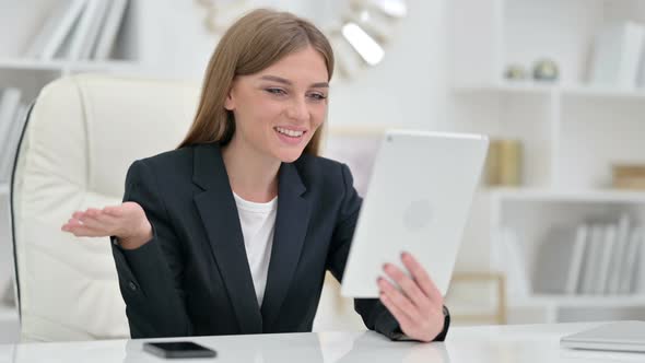 Professional Businesswoman Doing Video Call on Tablet 