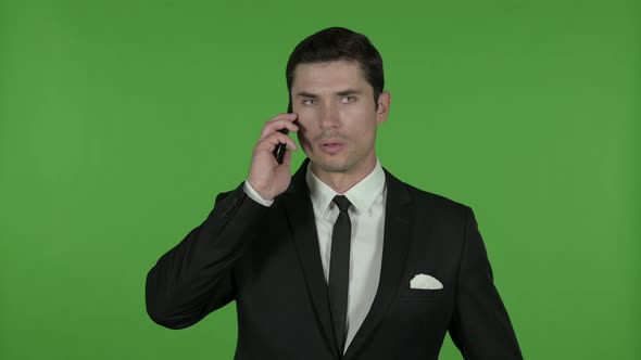 Ambitious Businessman Talking on Phone, Chroma Key