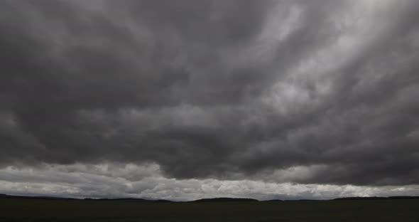 Storm Clouds In A Green Timelapse Field alt