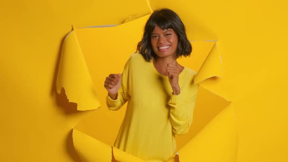 Joyed Woman Dances To Music Rhythmically Raises Hands and Sings Favorite Song