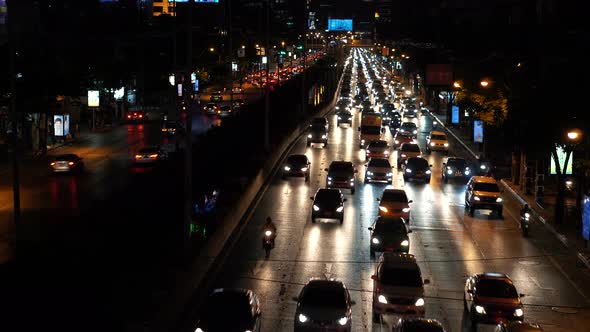 Timelapse Traffic Jam in Downtown at Dark Evening Time