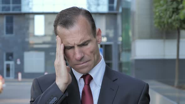 Headache, Stressed Businessman Feeling Uncomfortable