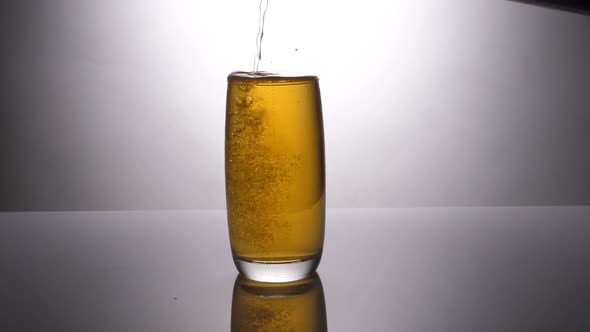 Pouring Beer Into A Glass 