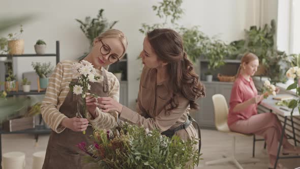 Young Women in Flower Shop