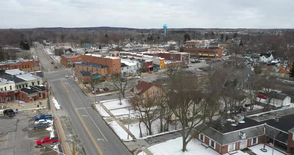 Oxford, Michigan neighborhood and downtown view from droneing forward.