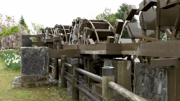 Water Wheels Catching Water In Spring