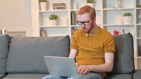 Professional Young Man Using Tablet in Office