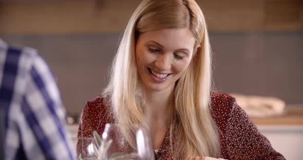 Woman Wearing Casual Cloth Chat Having Lunch with Her Friend in the Kitchen Eating Chicken and