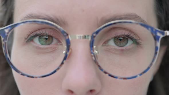 Close up of Blinking Eyes of Young Woman