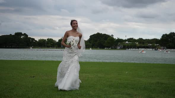 Slow motion Of Wedding Bride Happy Fun walking and running in the park