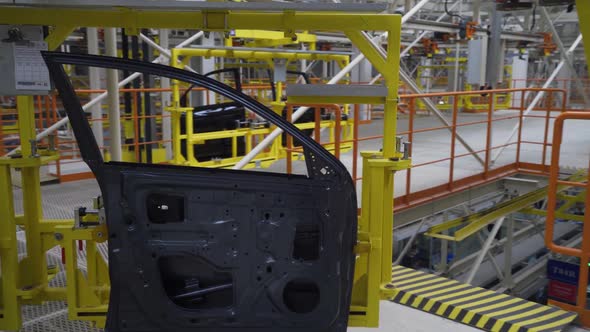 Automobile Plant Modern Production of Cars Transportation of Ready Car Doors on the Production Line