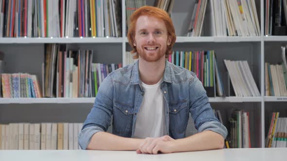 Portrait of Smiling Man with Red Hairs