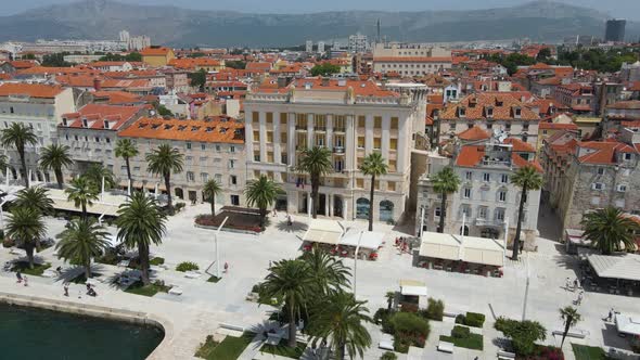 summer cityscape with Diocletian's Palace, the bell tower of Cathedral of St. Domnius And Riva prome