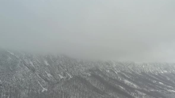 Heavy snow by winter on top of Veliki Krs mountain 4K aerial footage