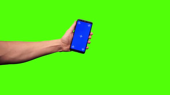 Smartphone in hand on a Greenscreen