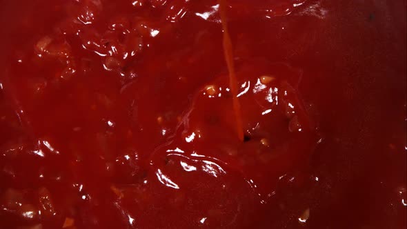 BBQ sauce being cooked from scratch in ultra slow motion 